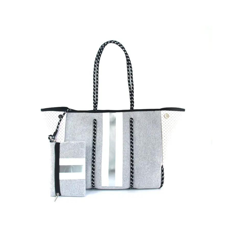 Bolso de neopreno gris con blanco, práctico y elegante, incluye estuche adicional para cosméticos. Ideal para universidad, trabajo, gimnasio o playa.