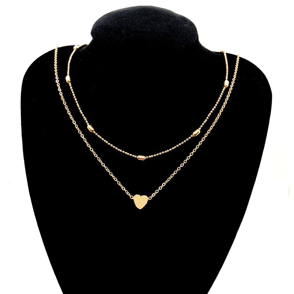 Choker de corazón dorado, elegante y delicado, ideal para regalar o complementar tu look.