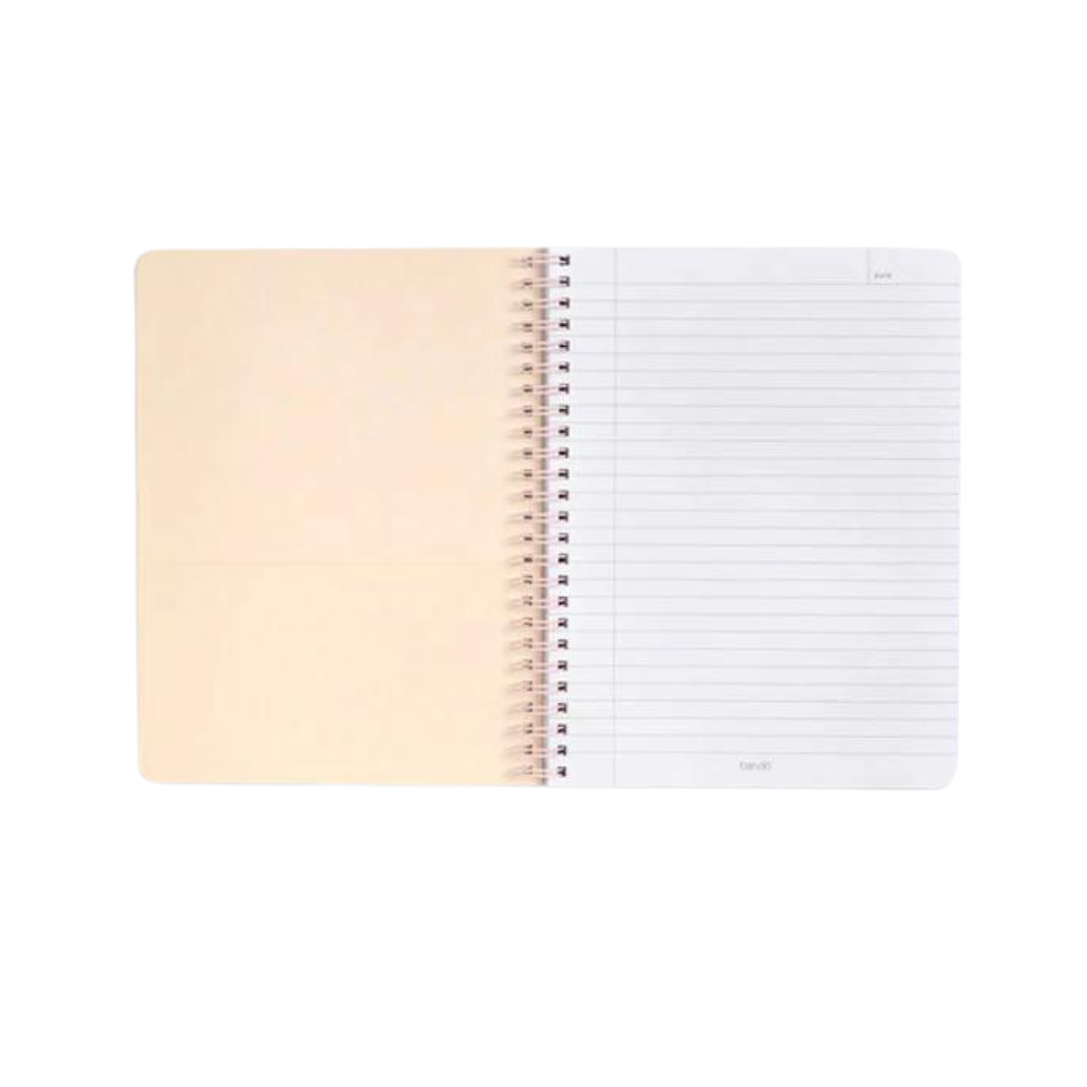 Cuaderno espiral "Face The Day" con 160 páginas rayadas, bolsillos dobles, espiral metálico de colores y frase inspiradora en la portada.