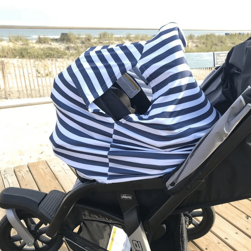 Cobertor para coche de bebé con UPF 50+ y estampado Love, gris, hojas verdes, o rayas azules, diseñado para protección solar, ventilación y comodidad.