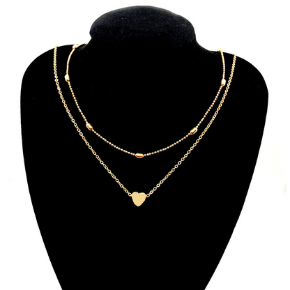 Choker de corazón dorado, elegante y delicado, ideal para regalar o complementar tu look.