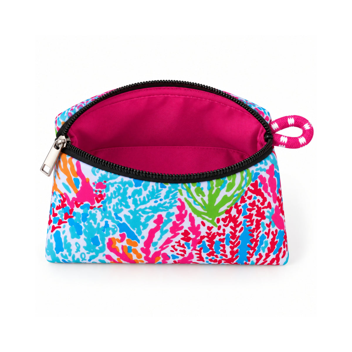 Neceser de neopreno Corales con estampado multicolor, cierre negro y productos de cuidado personal en su interior.