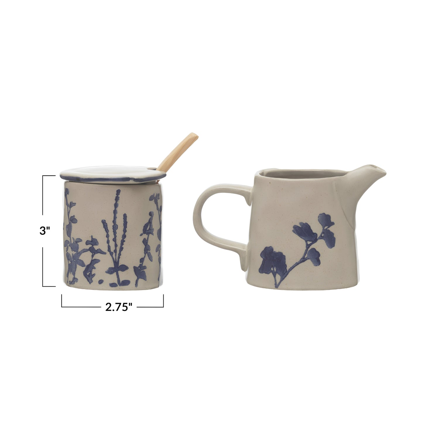 Set de azucarera y cremera en cerámica con motivos de espigas en blanco y azul, con cuchara de madera y acabado en esmalte reactivo.