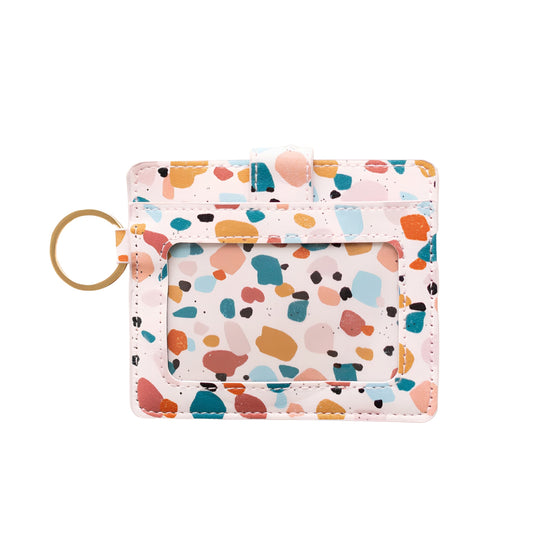 Tarjetero porta DNI con cierre a presión. Diseño minimalista y funcional.